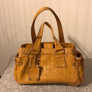 Mustard colored handbag